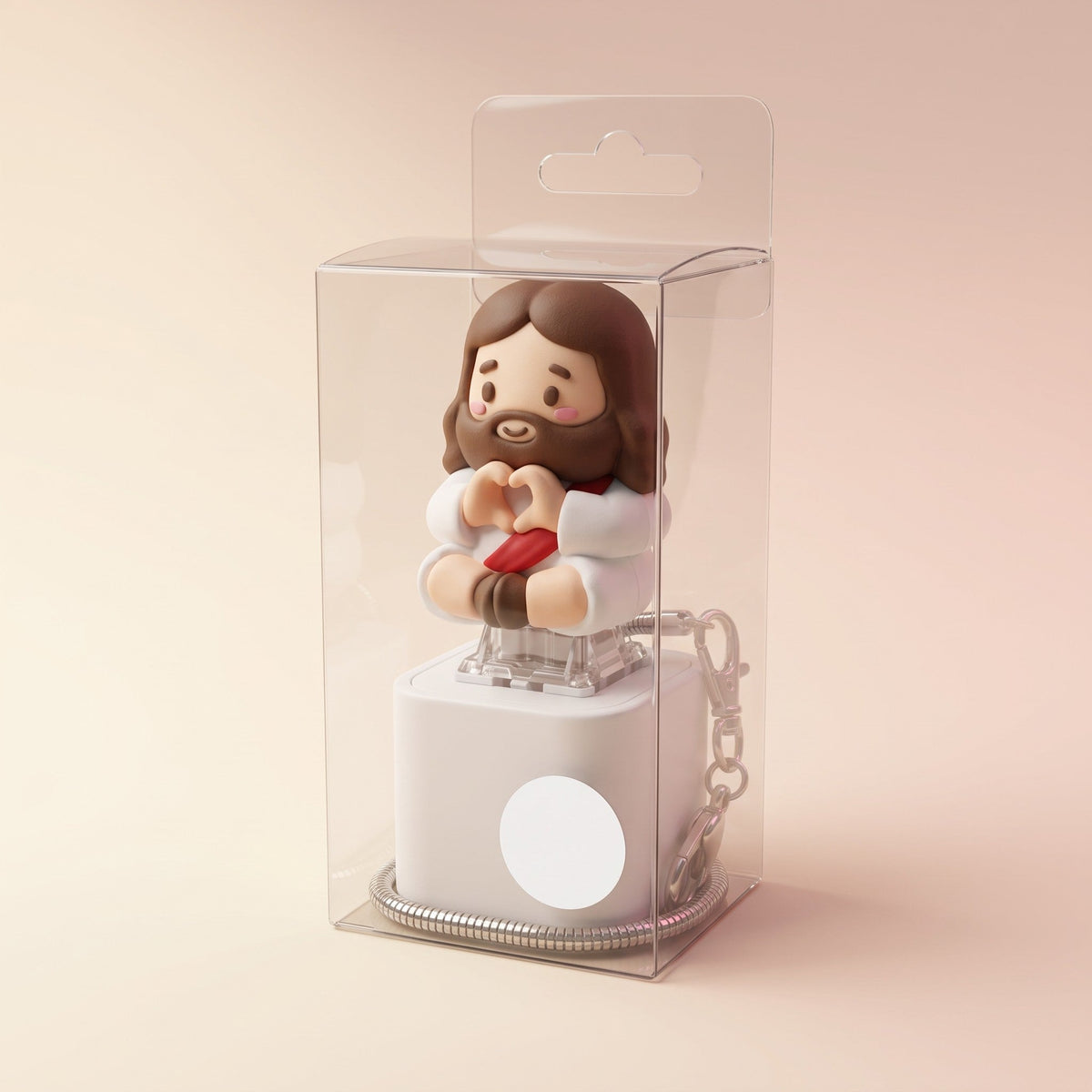 Clicky Jesus keychain in its clear hanging gift box