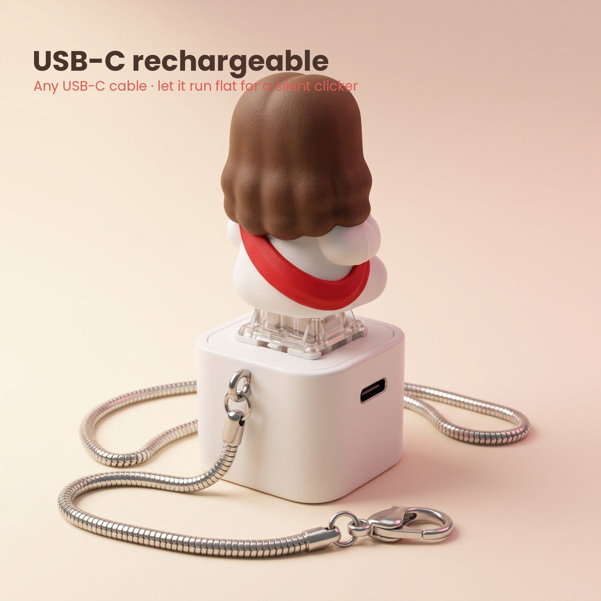 Back of Clicky Jesus keychain showing the USB-C charging port